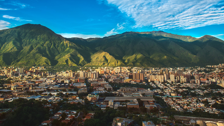 Panoramic aerial shot of Caracas with mountains in the background