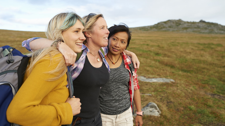 three women hiking