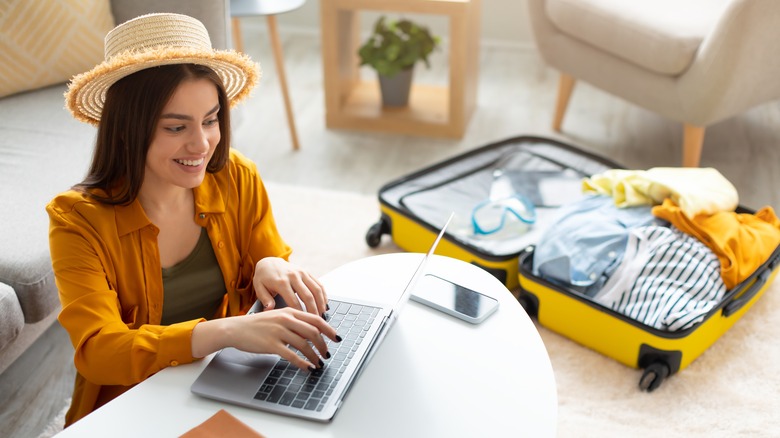 woman at hotel not unpacking