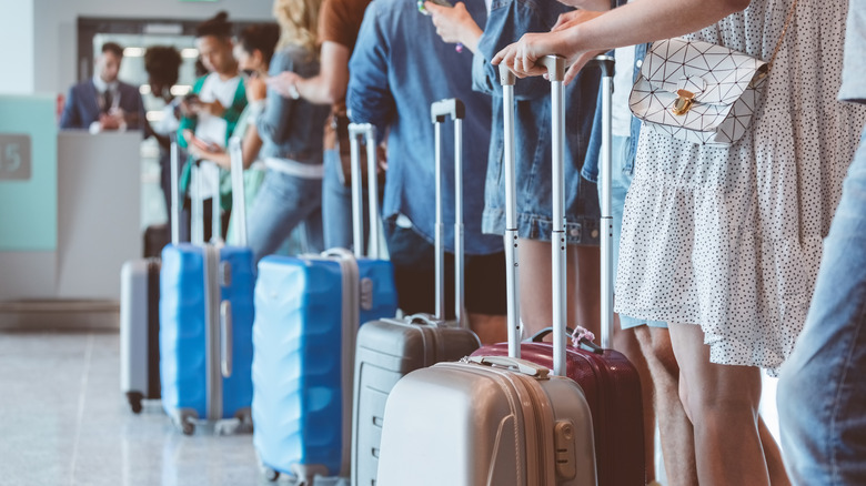 Line of passengers at check-in 