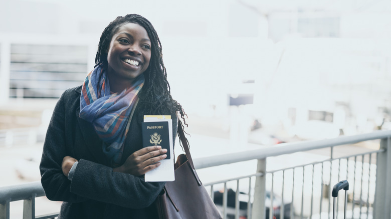 Traveler holding their passport