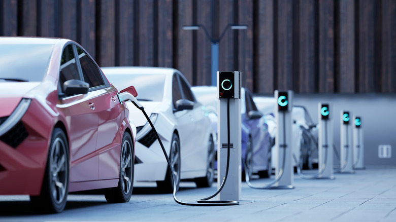 Electric cars charging on a street