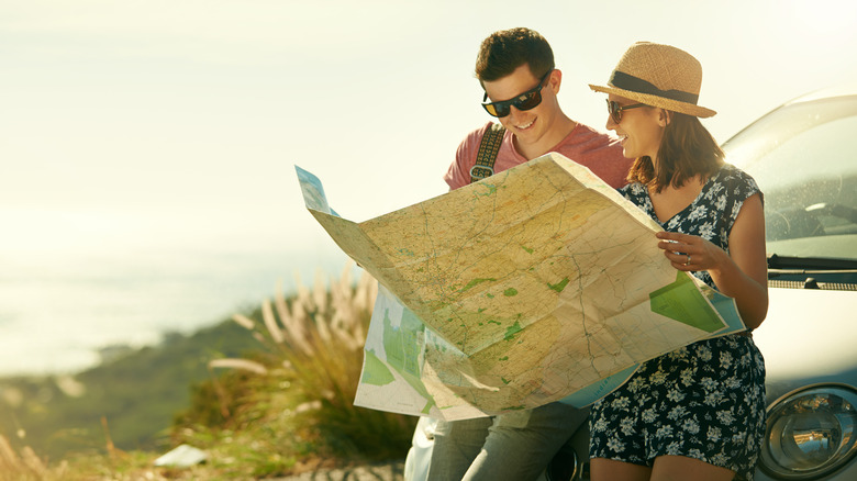 couple with road map