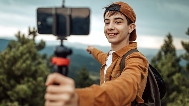 young man taking selfie