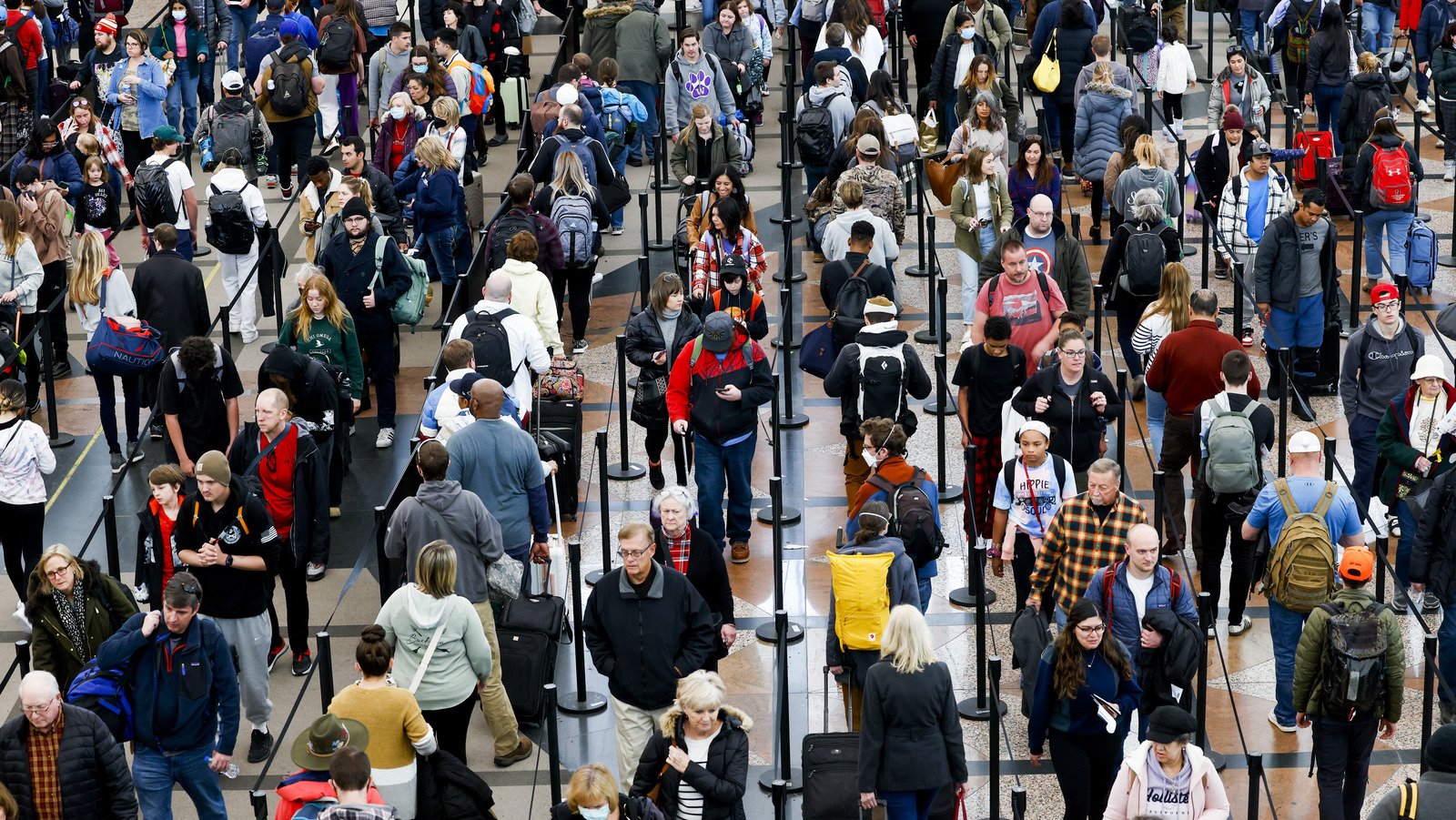Why You Should Think Twice Before Picking The Shortest Line At Airport
