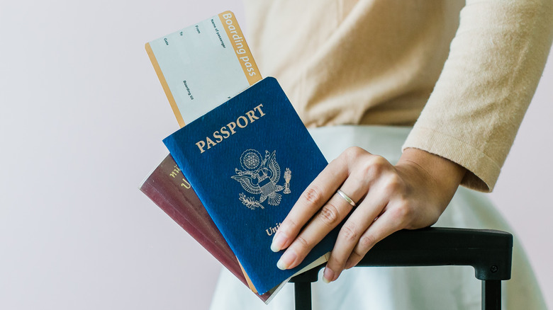 Carrying passports and luggage