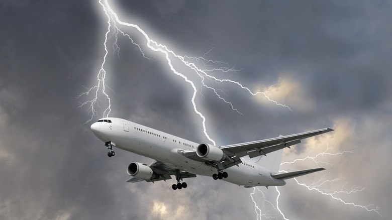 airplane flying through lightning