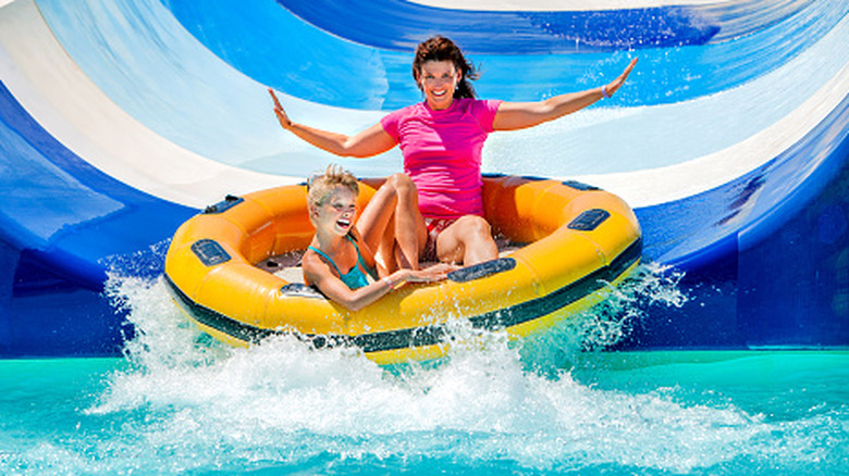 Family on a water slide