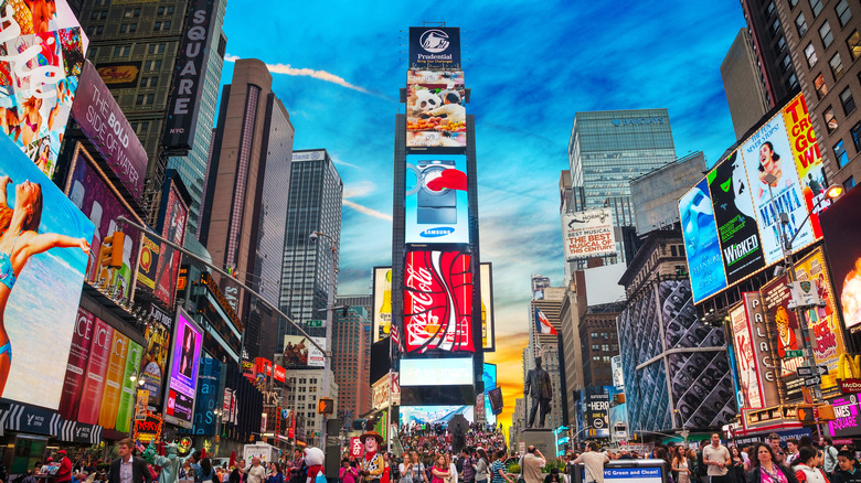Crowded Times Square illuminated 