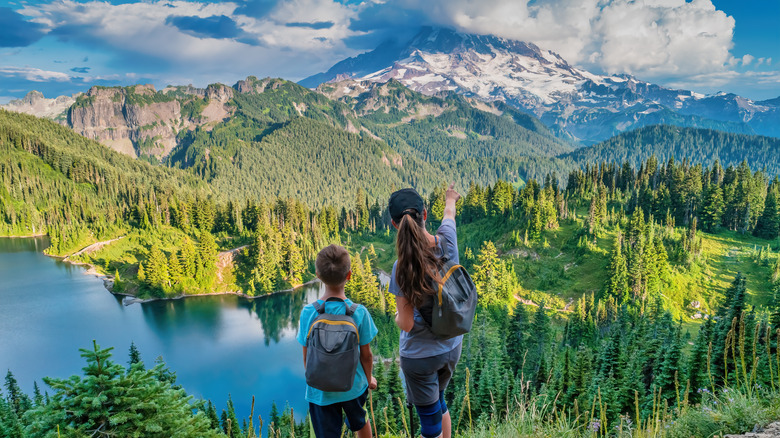 A woman and boy looking over Mt. Rainer National Park