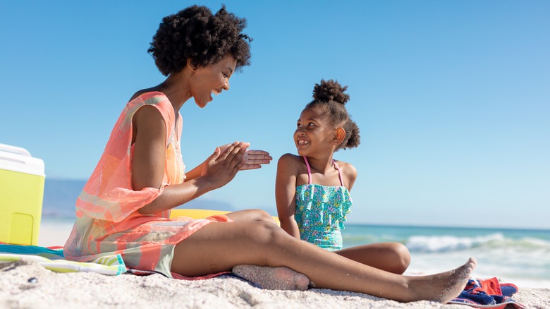 mother and child at beach