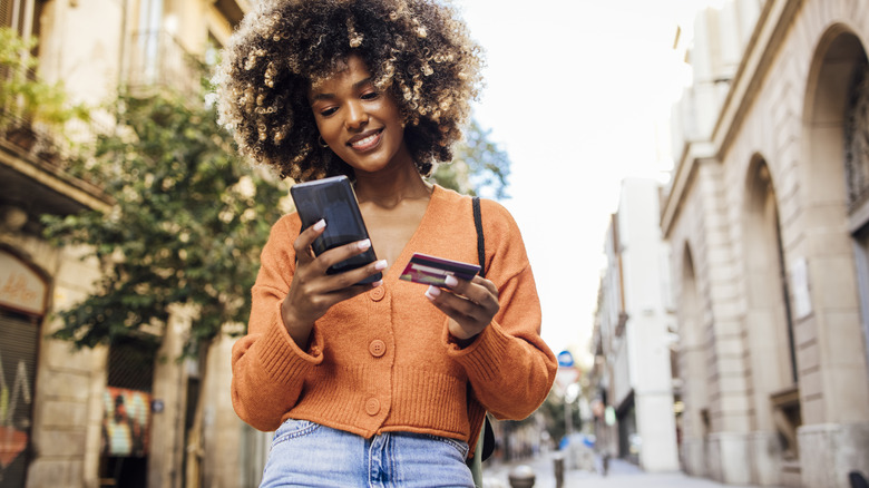 Young woman shopping online